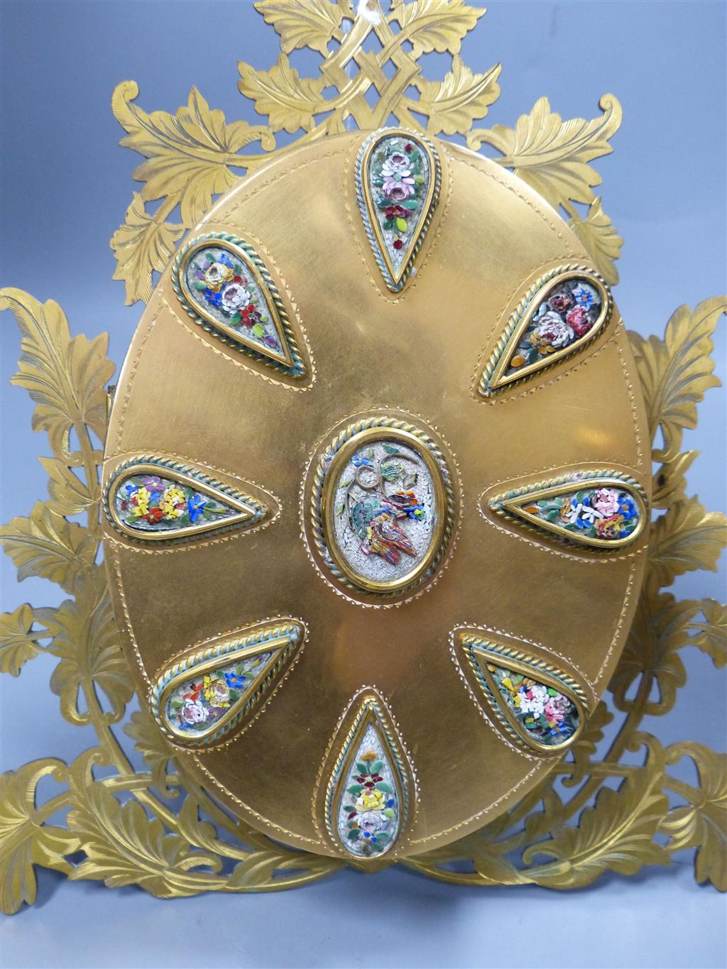 An ormolu triptych photograph frame with micro mosaic inlay